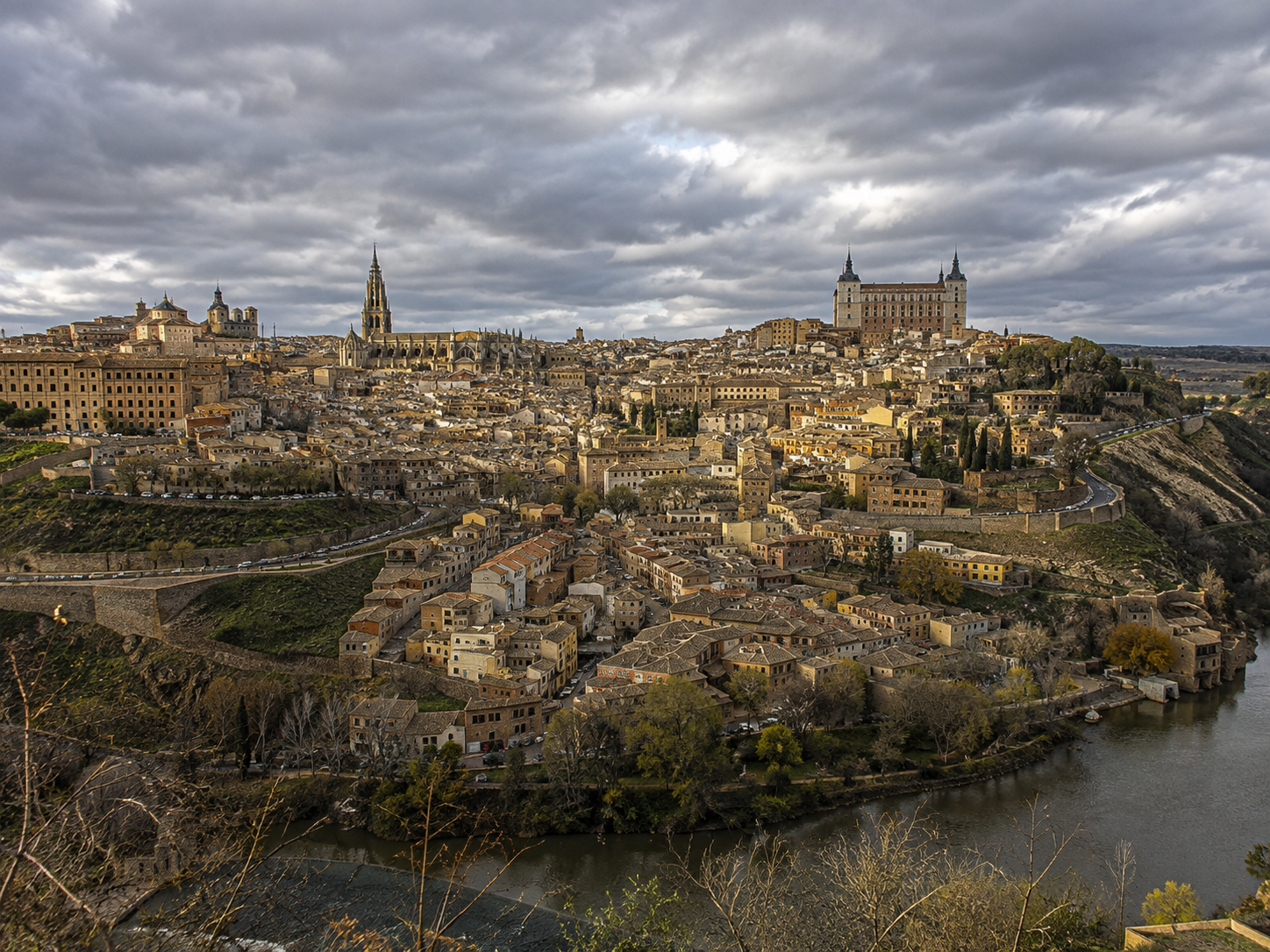Toledo under a dramatic Spanish winter sky.